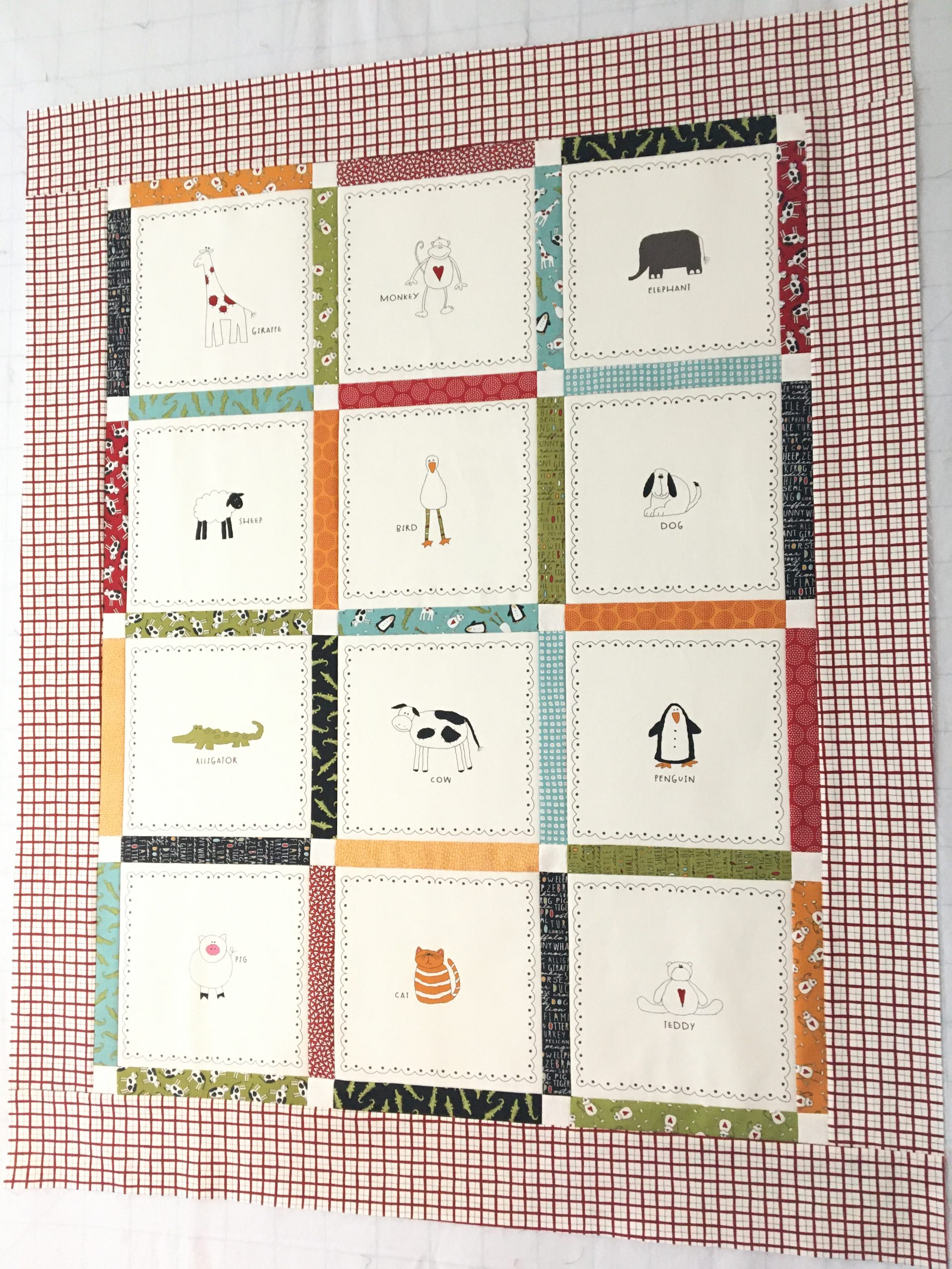 Duck Duck Moo baby quilt using animal crackers panel - quilted by Grace Elizabeth's Inc